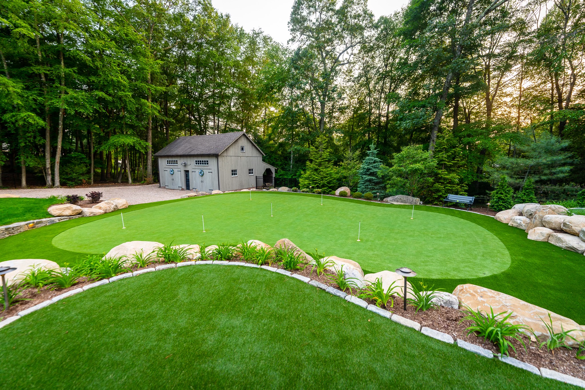 Manchester CT backyard putting green with custom barn