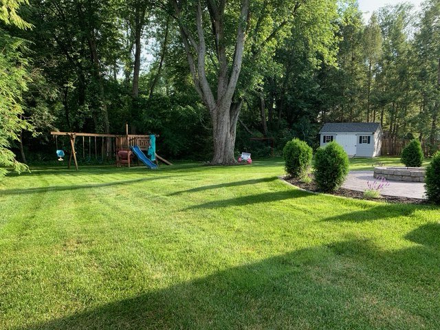 Synthetic turf playground